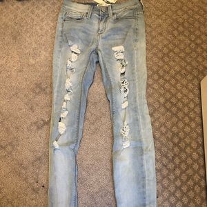 Ripped light wash jeans perfect condition.